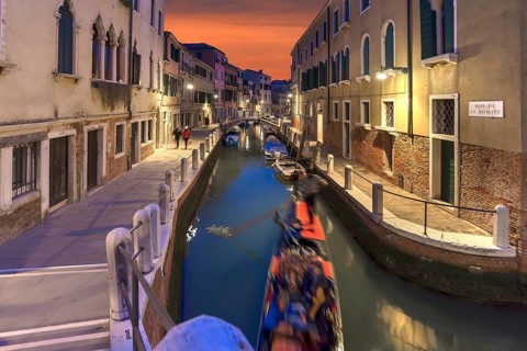 Gondola in the evening in a side canal in the Dorsoduro district, Venice, Veneto, Italy