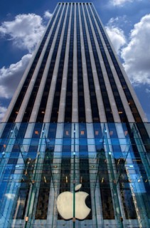 Apple logo in front of a skyscraper in Central Park, New York City, USA