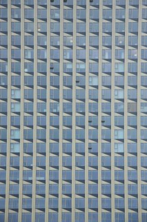 Glass wall from Tower 185, geometric rectangular glass wall with row of windows, glass building,