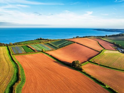 Colours of autumn Fields and Farms over Sheldon from a drone, Torbay, Devon, England, United