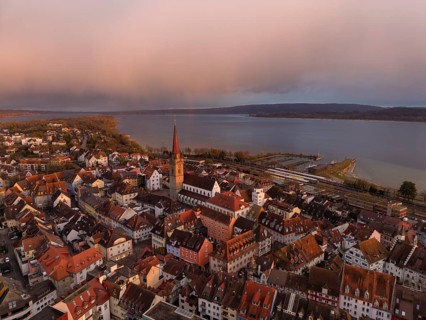 Aerial view of the town of Radolfzell on Lake Constance with the Radolfzell Minster at sunset,