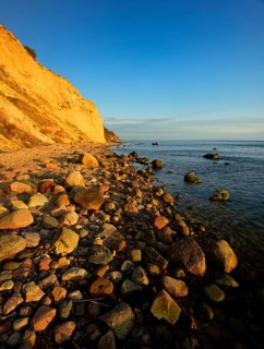 Cliffs and boulders on the coast of the Baltic Sea in the evening light, Reddevitzer Höft, Mönchgut