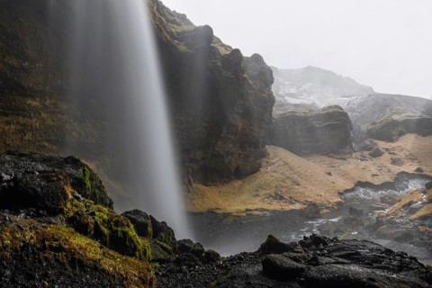 Waterfall in lava rock gorge, winter, Kvernufoss, Skogar, Iceland, Scandinavia
