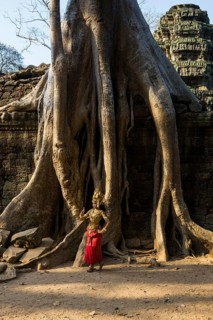 Young woman dressed as a temple dancer, Apsara, Ta Prohm, Angkor Wat, Angkor, UNESCO World Heritage