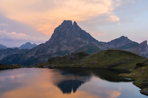 Landscape of Midi d'Ossau, in the French Pyrenees, The mountain and its reflection create a