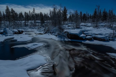 Stream in moonlight, Norrbotten, Lapland, Sweden, December 2022