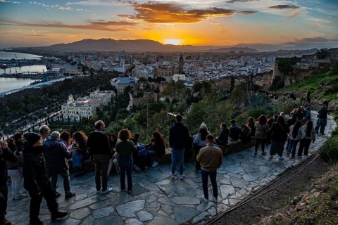 MALAGA, SPAIN - JANUARY 31, 2026: High angle view of a crowd of tourists gathered at a scenic