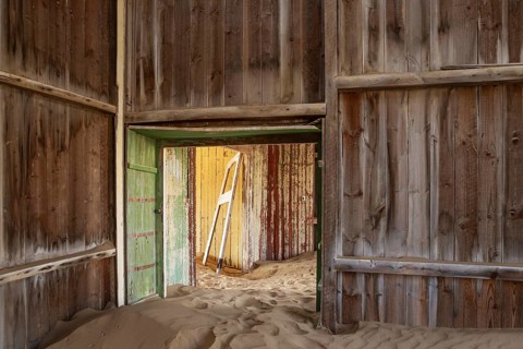 At Kolmanskop, the abandoned ghost town of the diamond days of the early 1900 and of German origin.