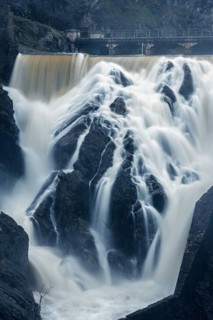 Captivating long exposure photograph showcasing the dynamic waterfall and rocky terrain at Presa o