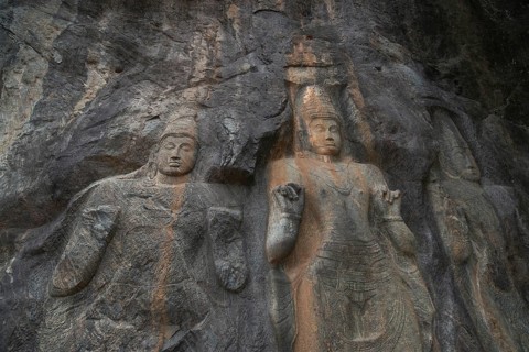The intricate ancient rock carvings at Buduruwagala highlight Sri Lanka's historical and cultural