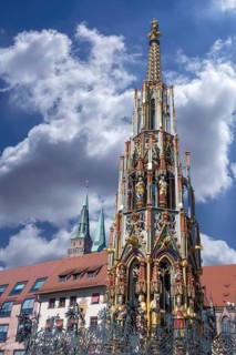Beautiful fountain, behind the Chamber of Crafts and the towers of St Sebaldus Church, Nuremberg,