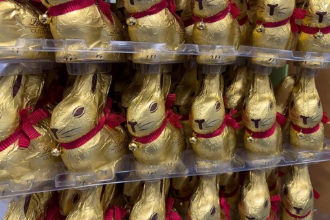 Display on shelf of retail wholesale of chocolate Easter bunnies chocolate Easter bunnies Easter