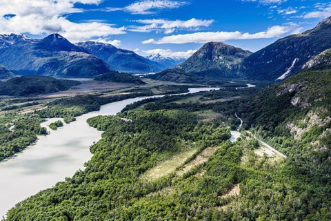 Road Carretera Austral, gravel road along river Rio Baker, north of Puerto Yungnay, aerial view,