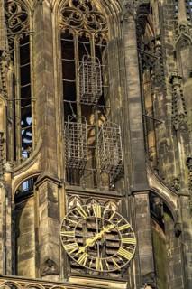 The iron baskets of the Anabaptists on the tower of the parish church of St. Lamberti in Münster,