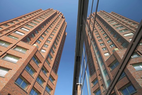 Lindner Hotel Main Plaza 88m, modern building, red high-rise building, view upwards, perspective,