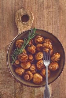 Fried mushrooms, with spices, in soy sauce, vegetarian food, homemade, no people