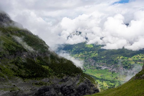 View of the valley to Grindelwald, cloudy mountain landscape, Bernese Alps, Bernese Oberland,