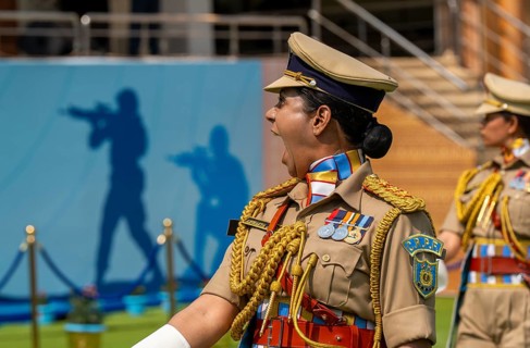 Central Reserve Police Force (CRPF) personnels march in ceremonial formation during a parade held