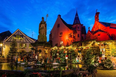 Houses illuminated and decorated for Christmas, Christmas market, blue hour, Eguisheim, Haut-Rhin