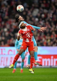 Header duel tackle action Serge Gnabry FC Bayern Munich FCB (07) against Leon Avdullahu TSG 1899