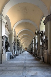 Arcade with tombs at the Monumental Cemetery, Cimitero monumentale di Staglieno), Genoa, Italy