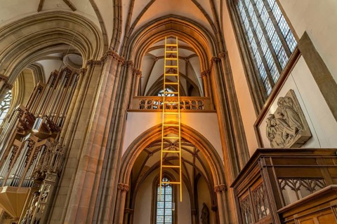 Light installation Ladder to Heaven in the interior of the parish church of St. Lamberti in