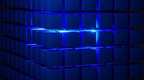 Cube structures create a captivating geometric arrangement highlighted by blue light, showcasing