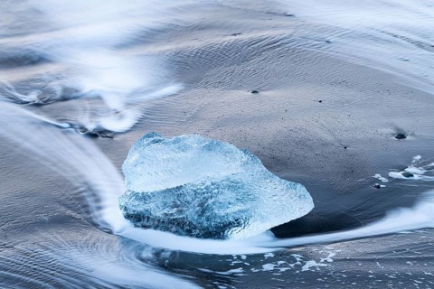 Chunks of ice on the black beach, lava beach, glacier ice, winter, Diamond Beach