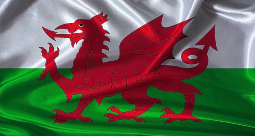 National flag of Wales with cloth texture. Wales flag with realistic texture background