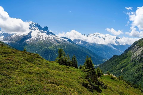 Mountain panorama with glaciated mountain peaks, Aiguille du Midi and Mont Blanc, hiking to