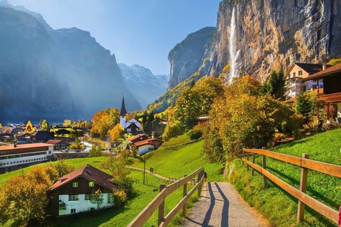 View of town and valley with Staubbach waterfall in autumn, Lauterbrunnen, Bernese Oberland, Canton