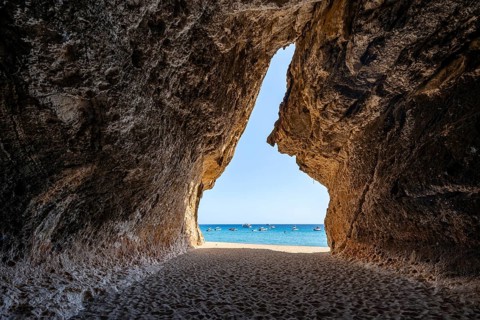 Rock cave on the beach at Cala Luna, Golfo di Orosei, Baunei, Sardinia, Italy
