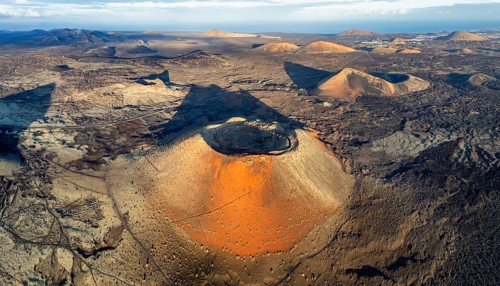 Caldera Colorada volcano, picturesque volcanic landscape with volcanic craters and lava fields in