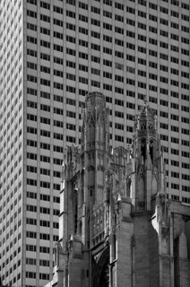 St Patrick's Cathedral in front of a skyscraper facade, New York City, USA