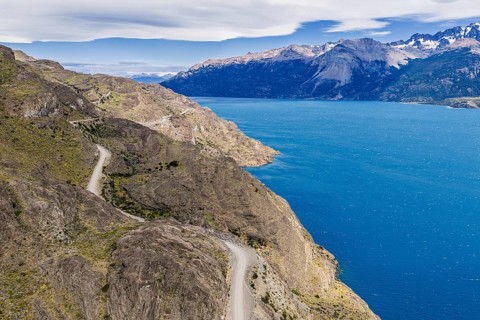 Road 265 along the southern slopes of lake Lago General Carrera, steep cliff, west of Chile Chico,