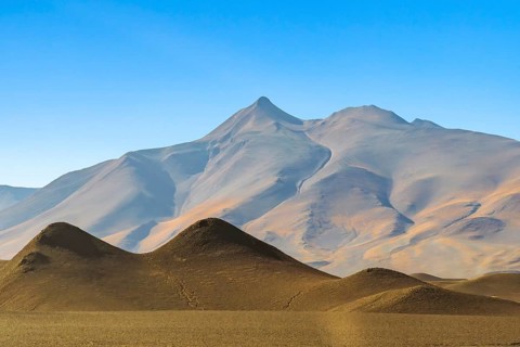 Soft light illuminates the serene La Puna highlands in the South American Andes, showcasing the