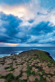 Rocky coast with basalt columns, coastline, dusk by the sea, Giant's Causeway, Giants Causeway,