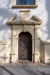 Side portal of the Ruhe-Christi Church with richly decorated wooden door, Rottweil, Rottweil