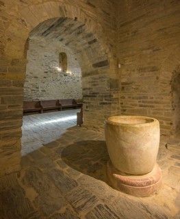Baptismal font in the north aisle, Prieuré de Serrabone, Boule-d'Amont, Département