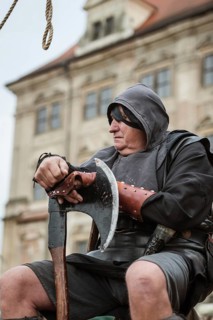 LUBIAZ, POLAND - AUGUST 25, 2018: Monastery Siege - Medieval executioner with the big ax