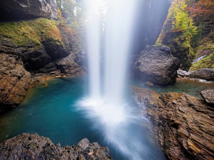 Waterfall mountain list in autumn-colored surroundings, Linthal, Klausenpass, Canton of Glarus,