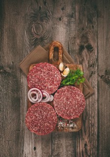 Raw cutlets, for burgers, minced meat, handmade, homemade, with spices, top view, no people