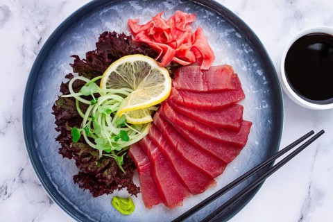 Tuna sashimi, with side dish, on a marble table, homemade, no people
