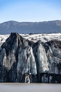 Ice structure with crevasses at the end of a glacier tongue, Sólheimajökull glacier, South Iceland,