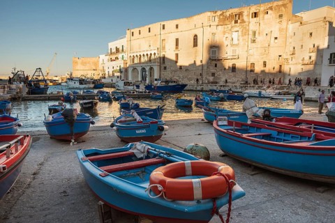 MONOPOLI, ITALY - SEPTEMBER 27, 2018: Blue boats in the marina