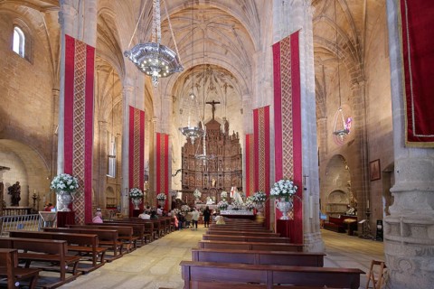 Interior view of Iglesia Concatedral de Santa Maria, church with banners and flags, UNESCO old