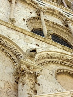 Magnificent stone carvings, figures and reliefs, façade of the Cathedral of San Cerbone, Basilica