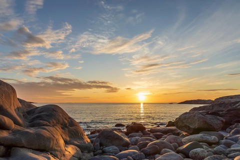 Sunset on the North Sea with archipelago on the west coast near Lerkil, Hallands län, Sweden