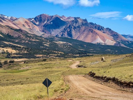 Road Ruta 41, gravel road, arid volcanic landscape, Los Antiguos - Paso Roballo, aerial view,