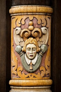 Façade detail on Wedekindhaus, historic half-timbered house in Renaissance style on the market
